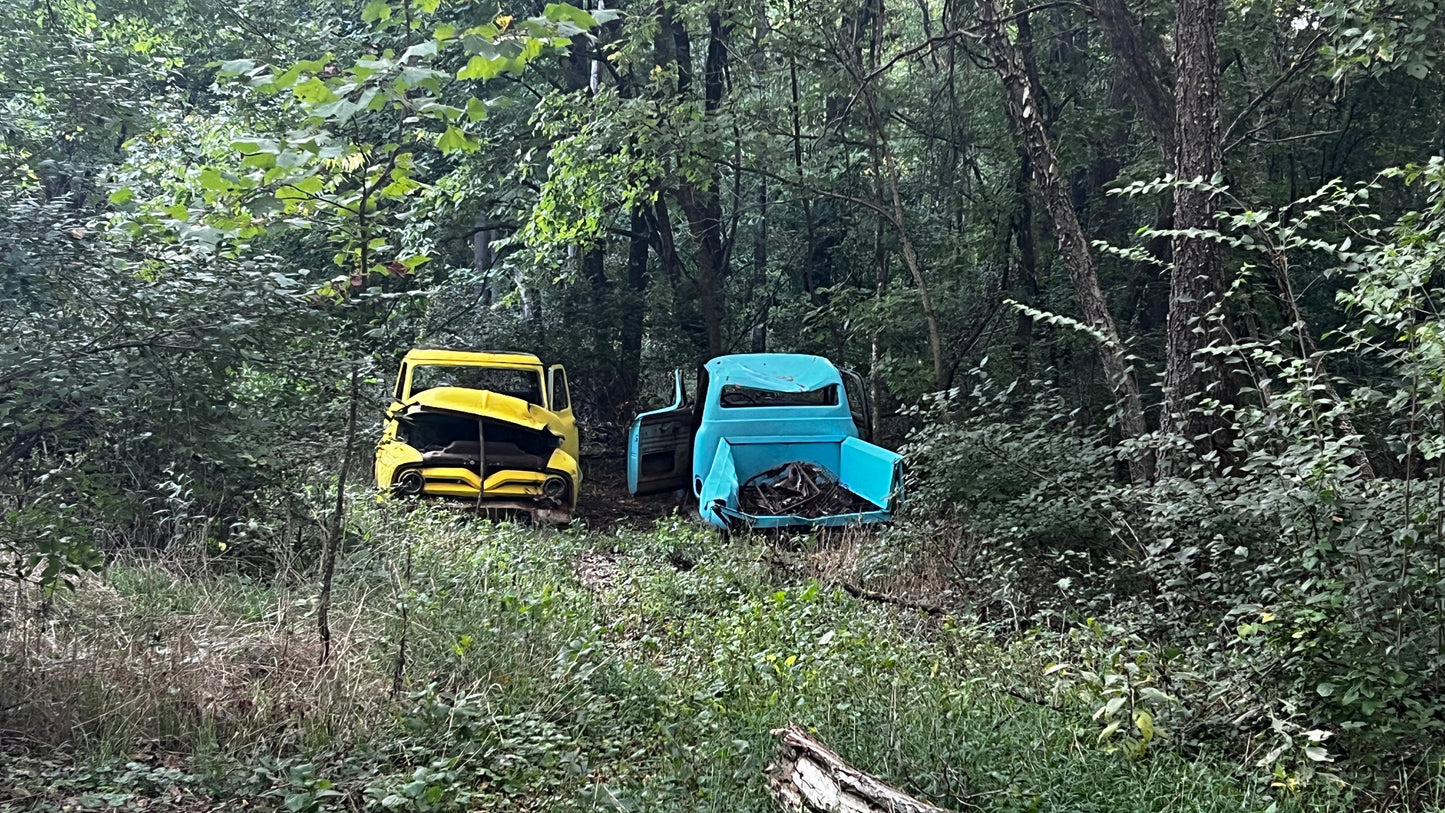 Two Used Old Decaying Trucks